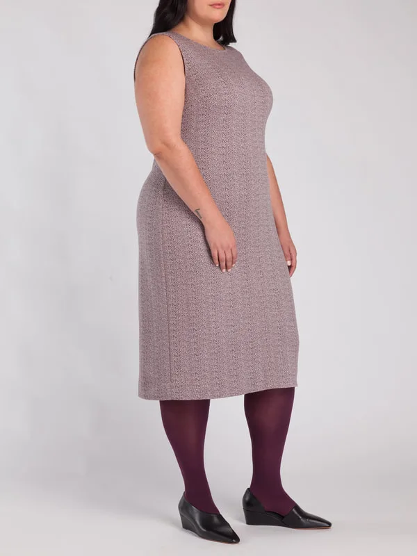 A model is pictured, wearing LISA AVIVA's Wool Sheath Dress, in Rocky Mountain Skies.