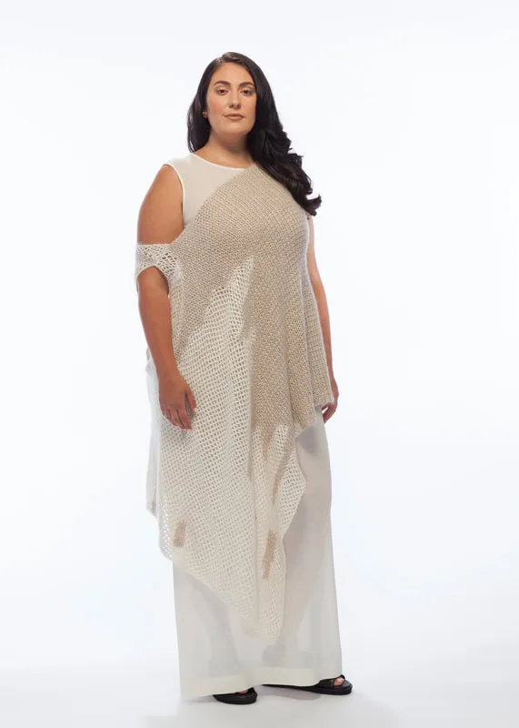 The Hand Crocheted Poncho, is pictured with the Column Dress, both from LISA AVIVA's  Spring/Summer 21 Collection.