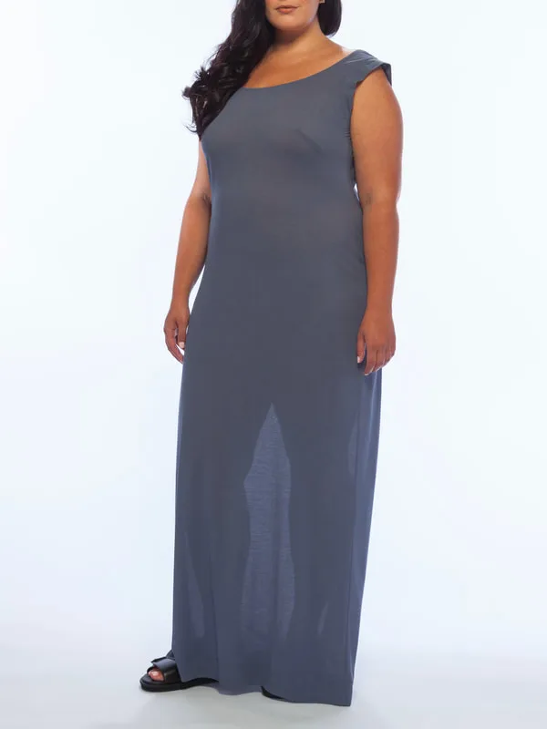 Curve Model, Sarah, is pictured in LISA AVIVA's Scoop Neck Column Dress, in Aegean Blue, from the Spring/Summer 21 Collection.