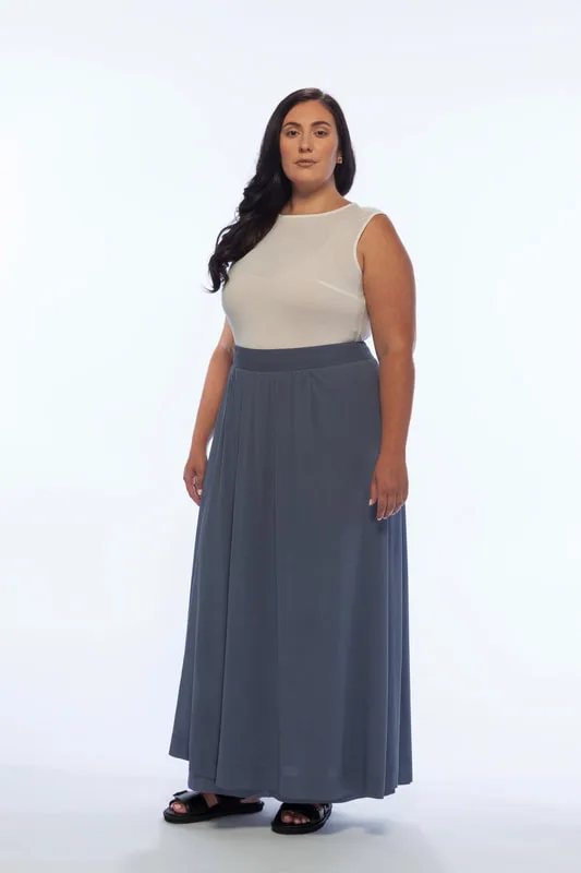 The Column Tank Top, is pictured with the Double Layer Skirt, both from LISA AVIVA's Spring/Summer 21 Collection.