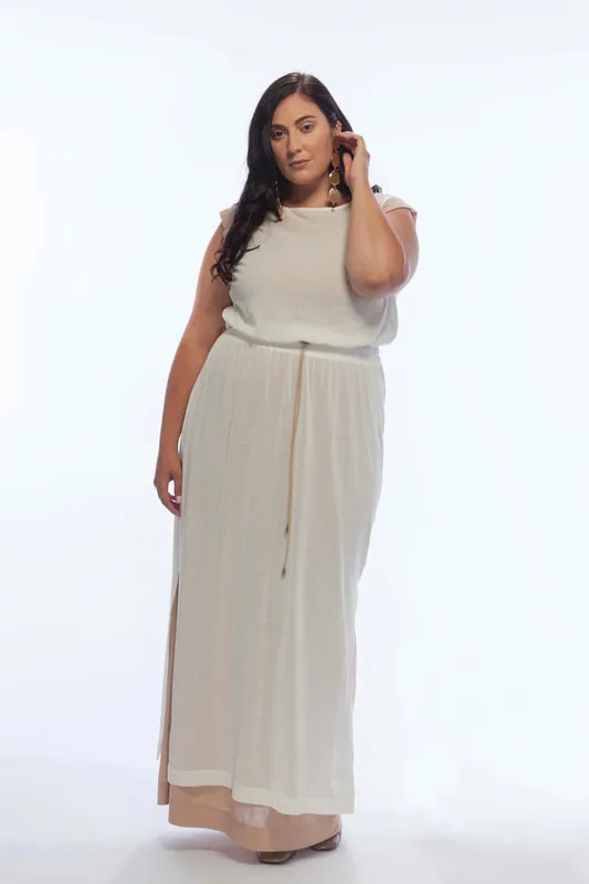 The Ethereal Tunic Dress, is pictured with the Scoop Neck Column Dress, both from LISA AVIVA's Spring/Summer 21 Collection.